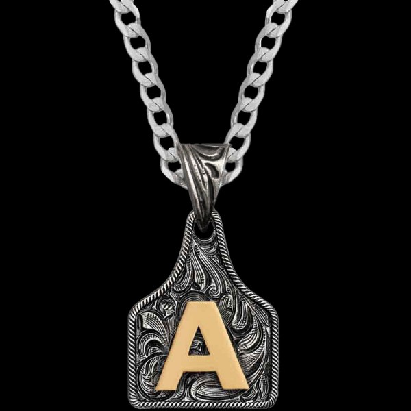 "Check out our Mini Initial Cow Tags! Crafted on a German Silver base featuring a traditional rope edge and our beautiful Jeweler's Bronze initial. For additional Rustic Western charm, we added our signature antique finish. Choose your desired initia